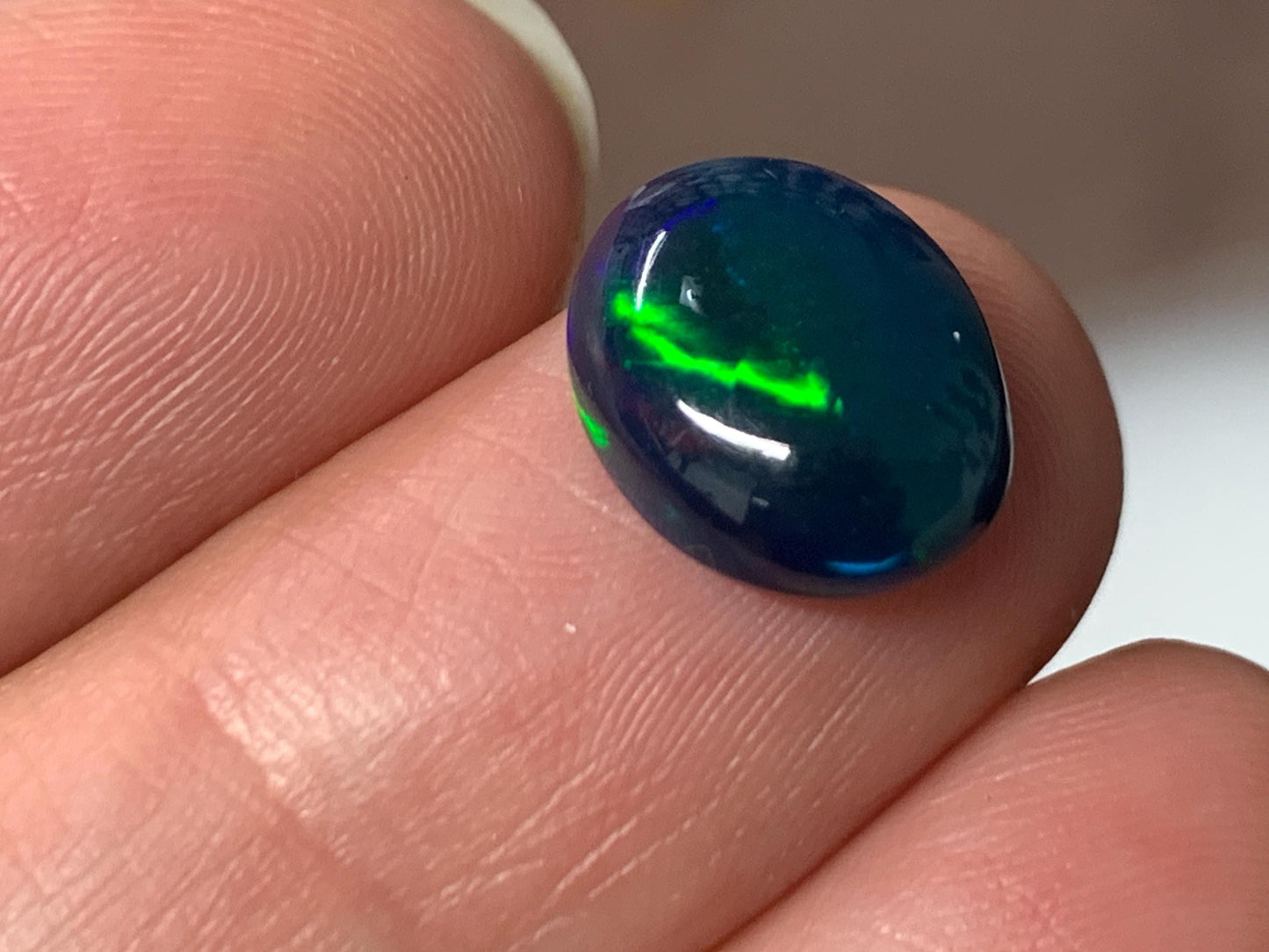 Natural Black Ethiopian Opal oval 9x11x4mm cabochon