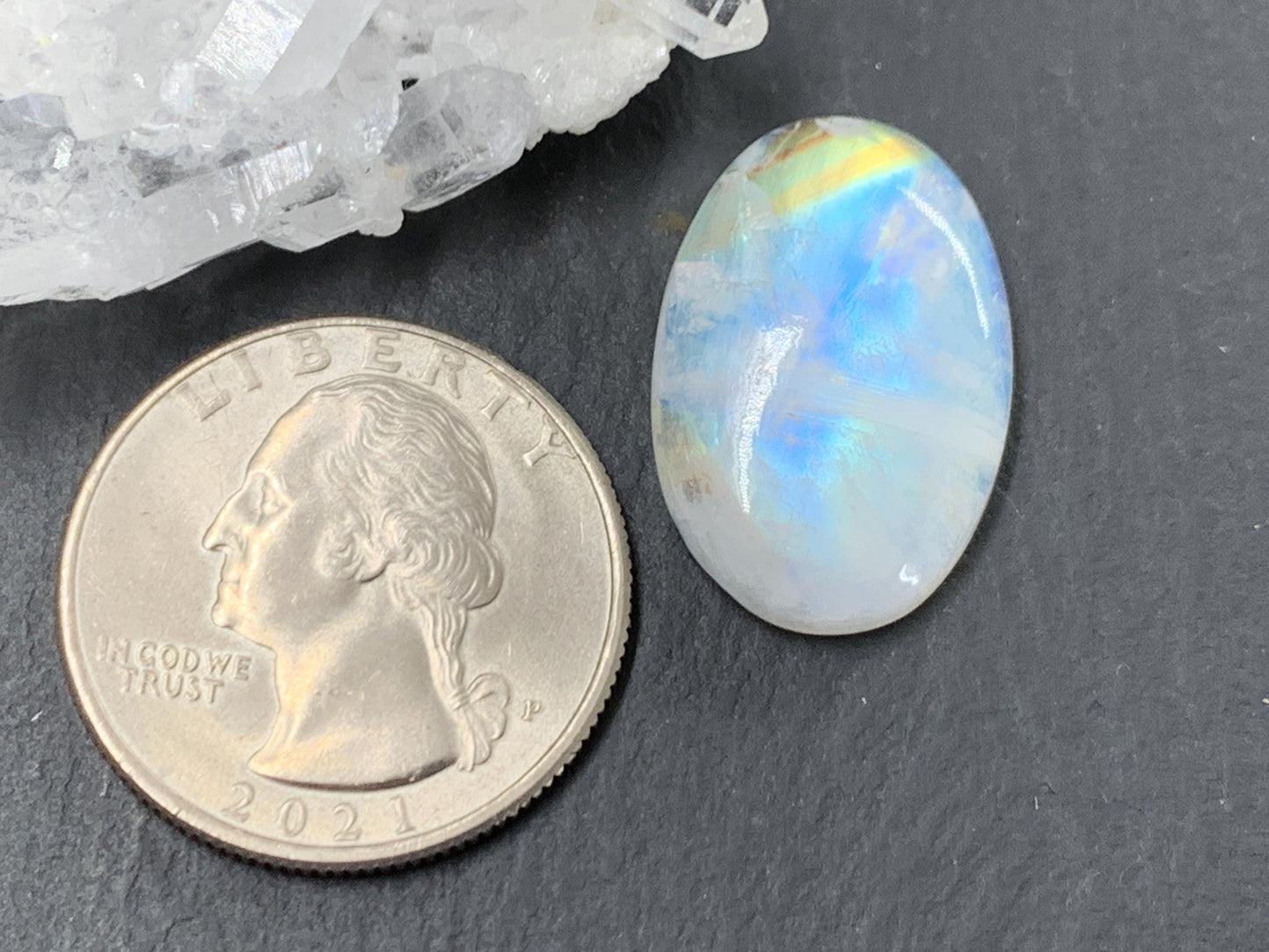 Rainbow Moonstone oval 23x16x6mm cabochon