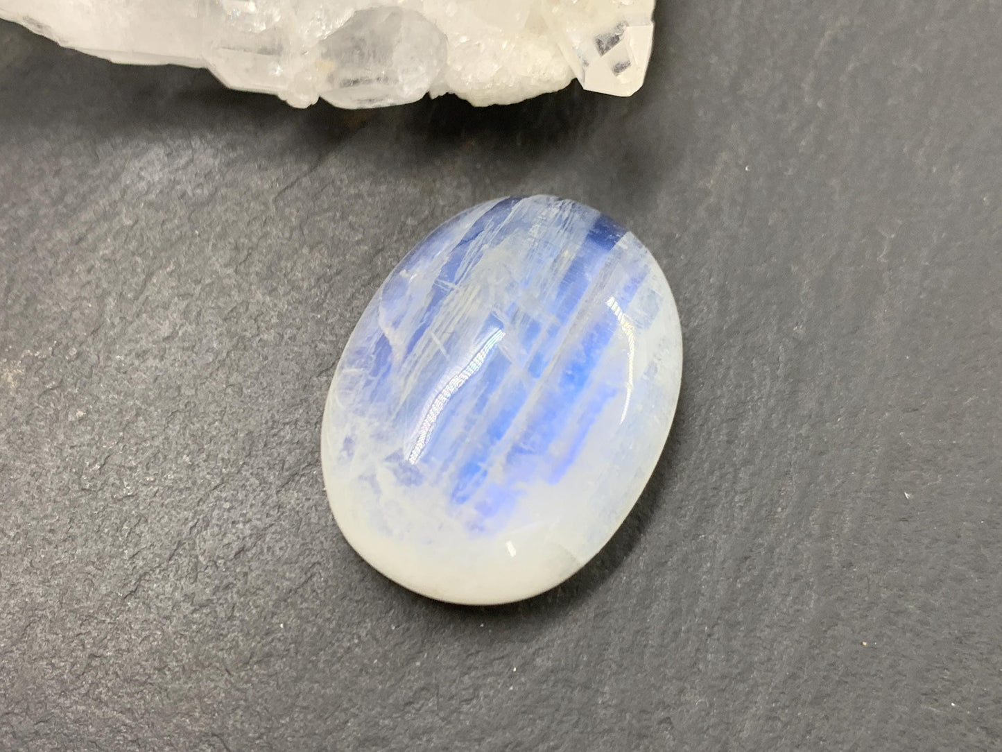 Rainbow Moonstone oval 22x17x8mm cabochon