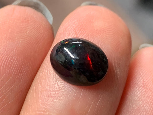 Natural Ethiopian Black Opal 8x10x4mm cabochon