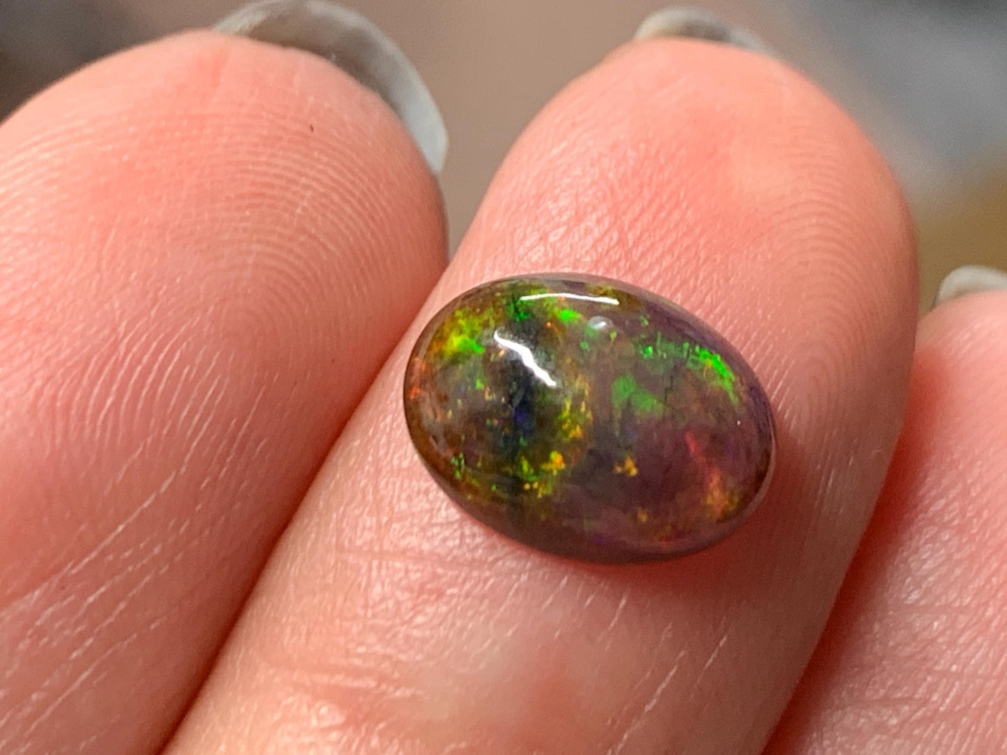Natural Ethiopian Black Opal 7x10x3mm cabochon