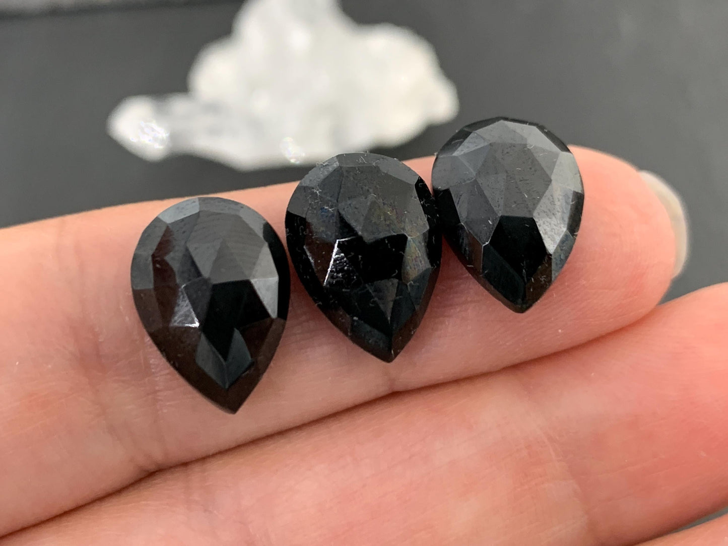 Faceted Black Spinel pear 10x14mm cabochon