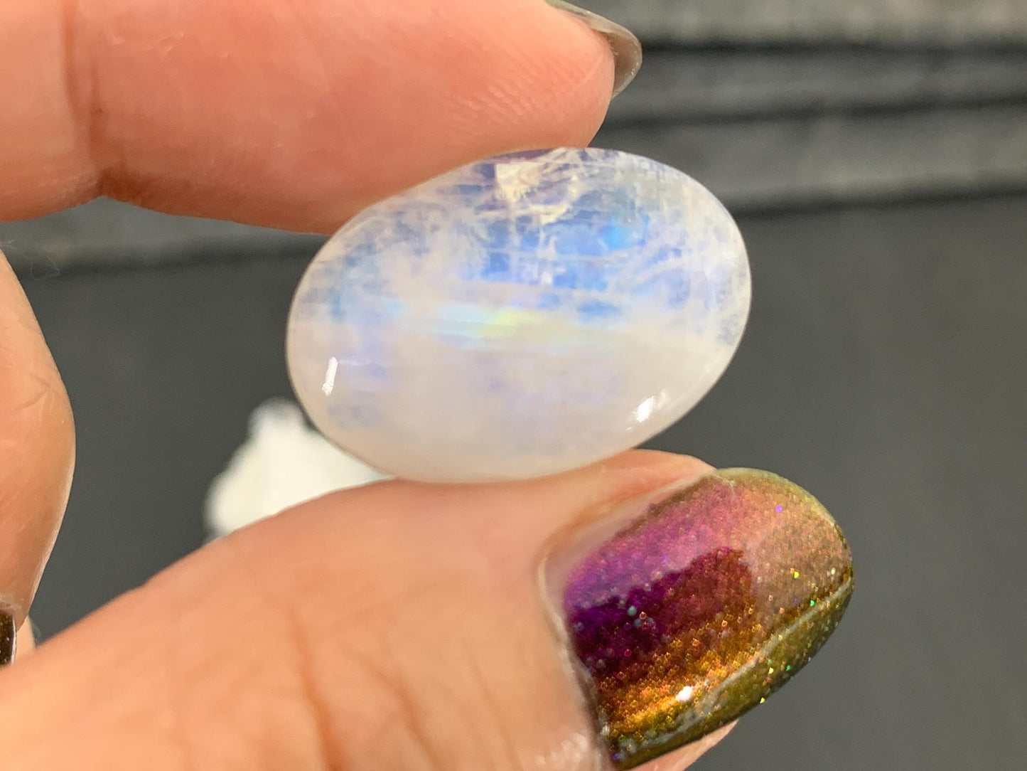 Rainbow Moonstone oval 21x15x6mm cabochon