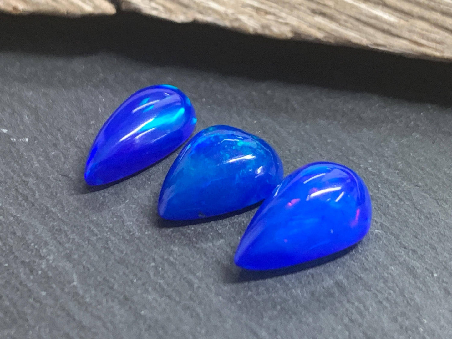 Ethiopian Opal pear 11-13mm long cabochon - Natural Opal smoked to blue color