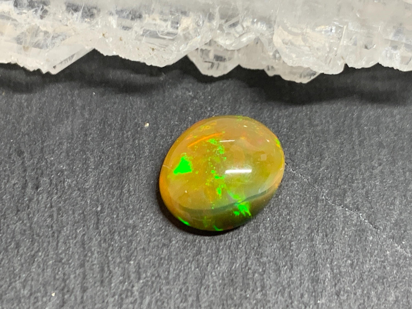 Natural Black Ethiopian Opal oval 9x11x4mm cabochon