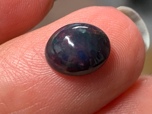 Natural Ethiopian Black Opal 7x9x4mm cabochon