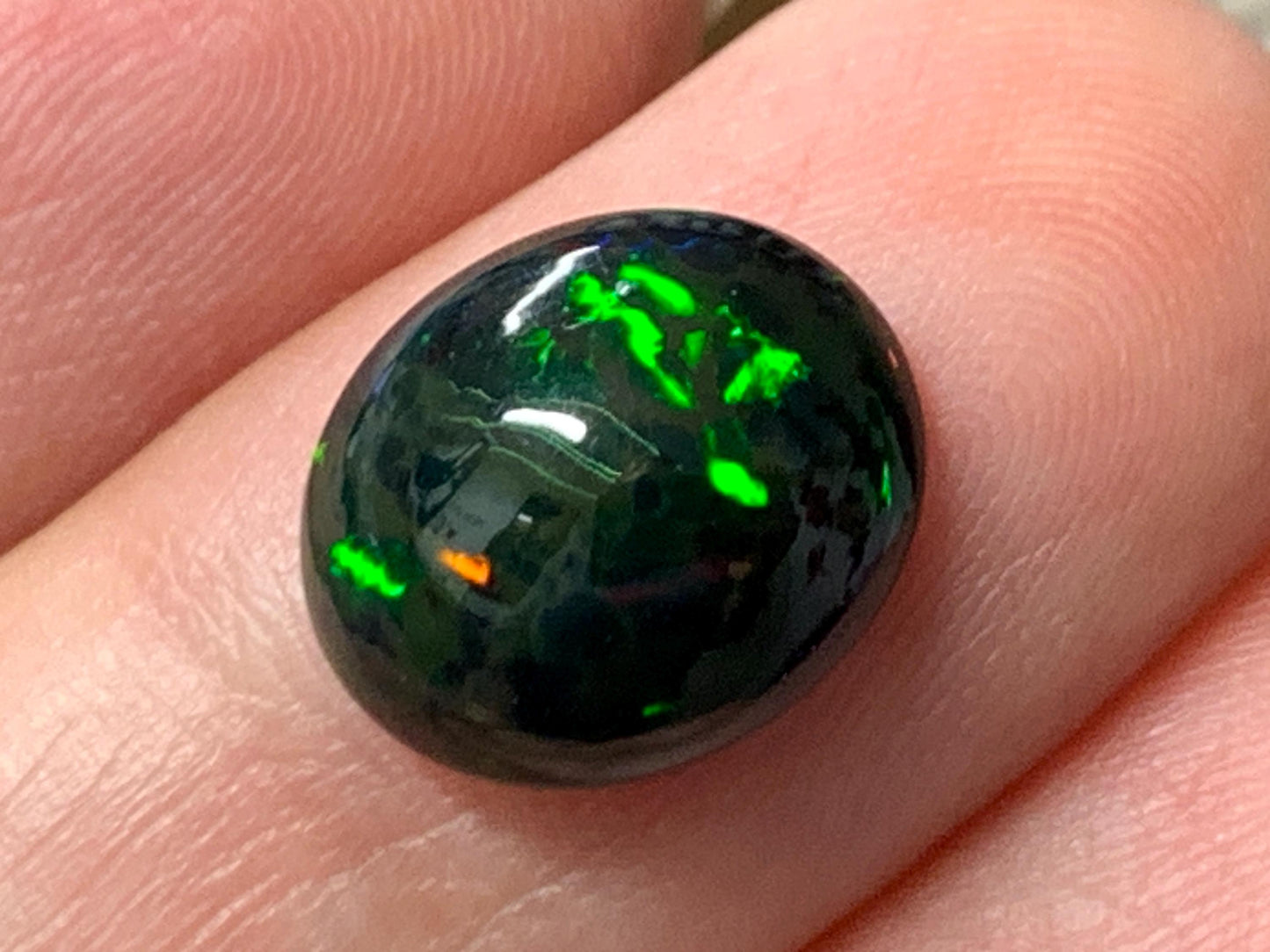 Natural Ethiopian Black Opal 10x12x4.5mm cabochon