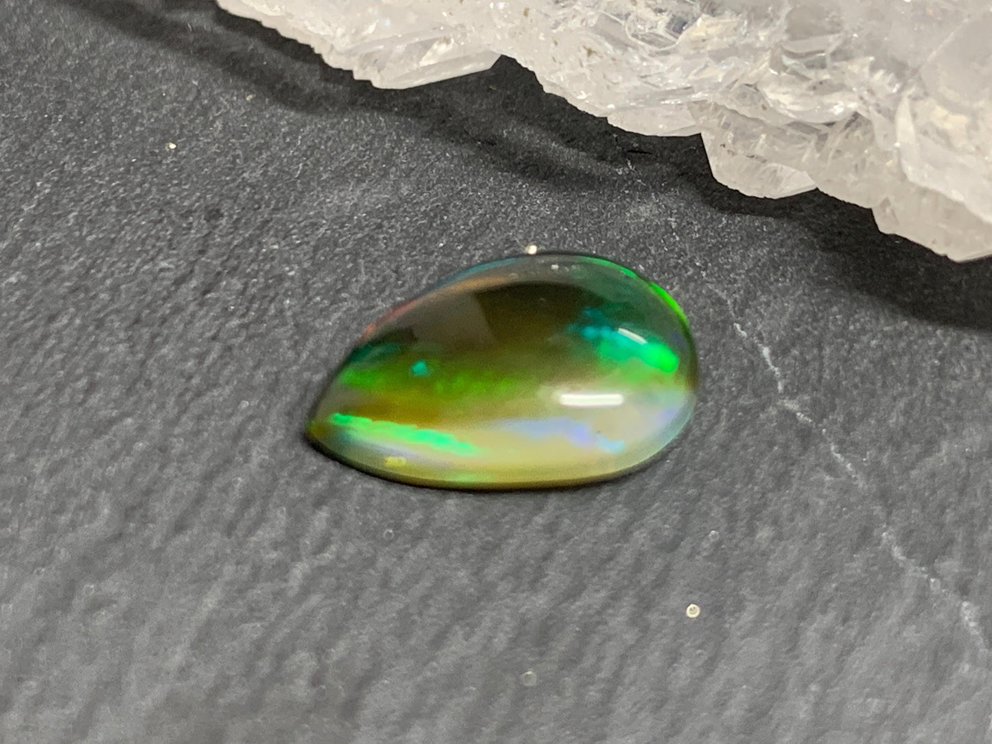 Natural Black Ethiopian Opal pear 9x12x3mm cabochon