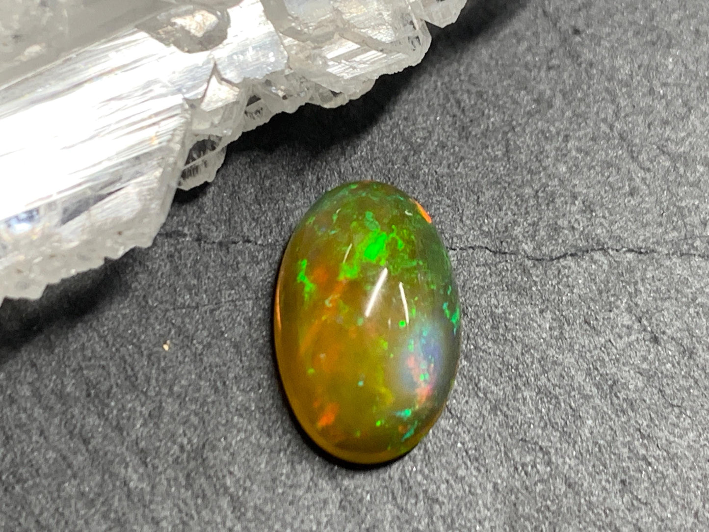 Natural Black Ethiopian Opal pear 7x12x4mm cabochon