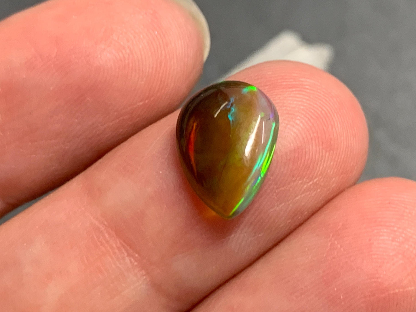 Natural Black Ethiopian Opal pear 9x12x3mm cabochon