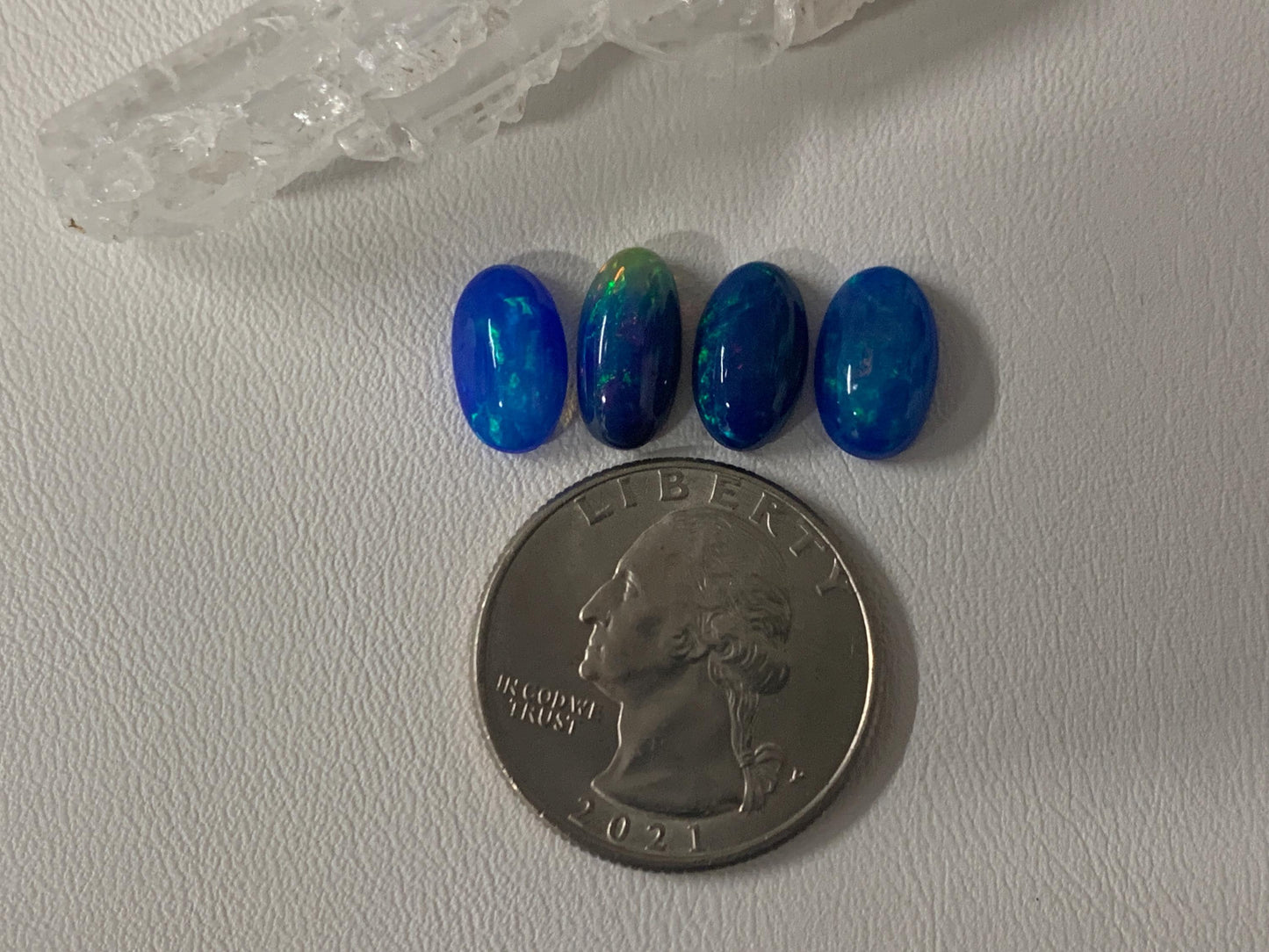Ethiopian Opal oval 11-12mm long cabochon - Natural Opal smoked to blue color