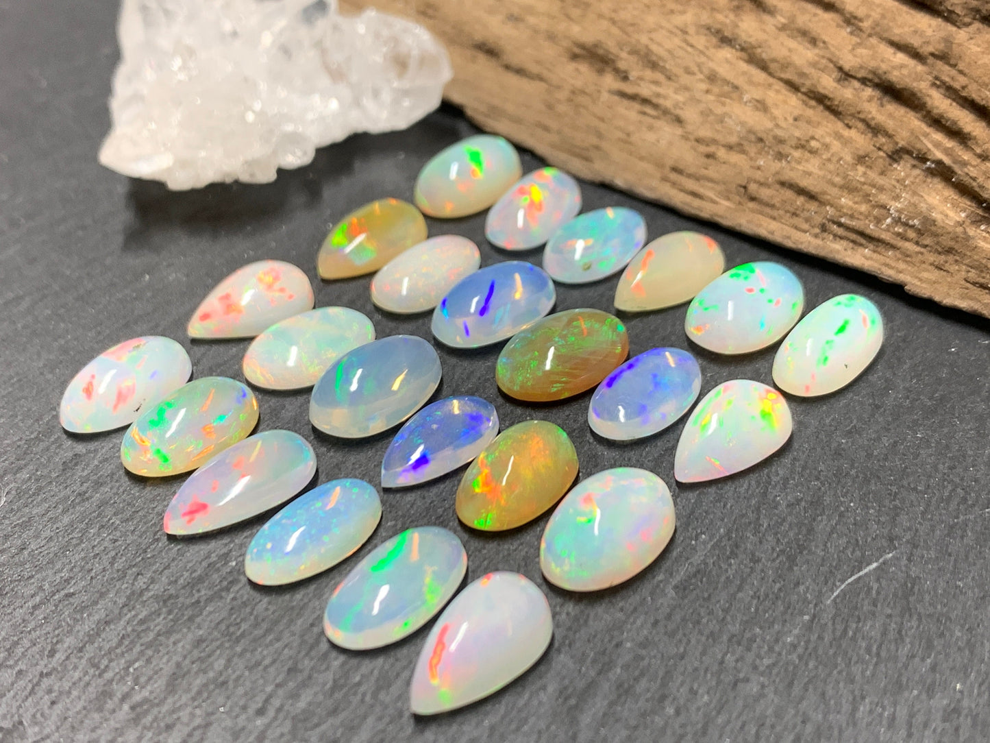Ethiopian Opal pear, oval 11-12mm long cabochon