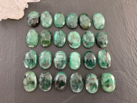Faceted Emerald oval 10x14mm cabochon