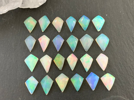 Faceted Welo Opal kite 7x9mm cabochon
