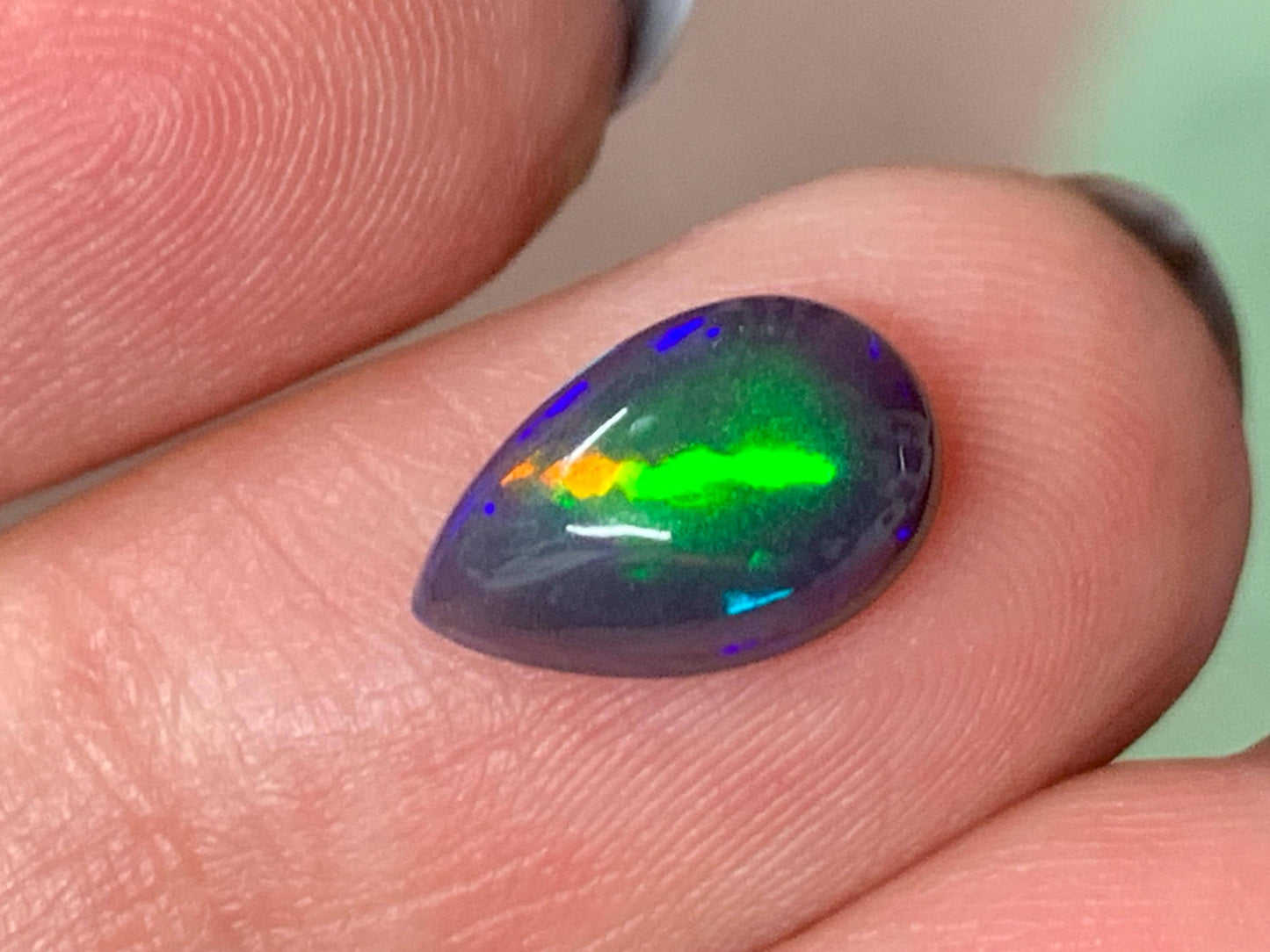 Natural Ethiopian Black Opal 7x11x4mm cabochon