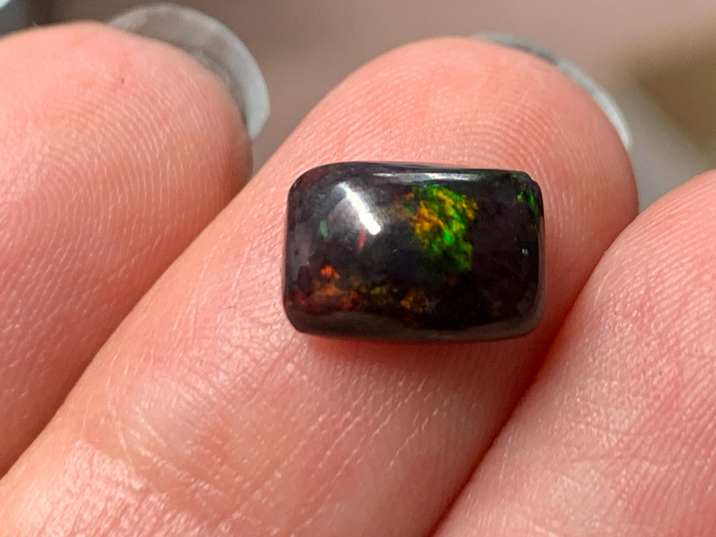 Natural Ethiopian Black Opal 6x9x3mm cabochon