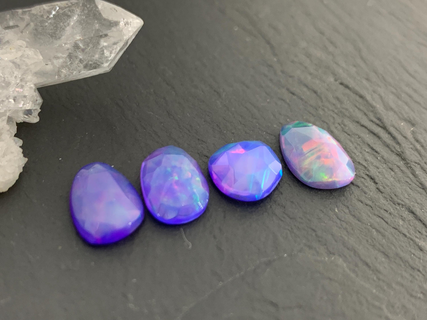 Faceted Ethiopian Purple Opal 9-11mm cabochon