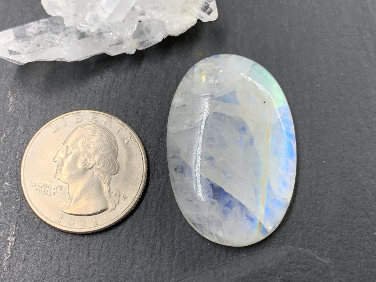 Rainbow Moonstone oval 38x25x7mm cabochon