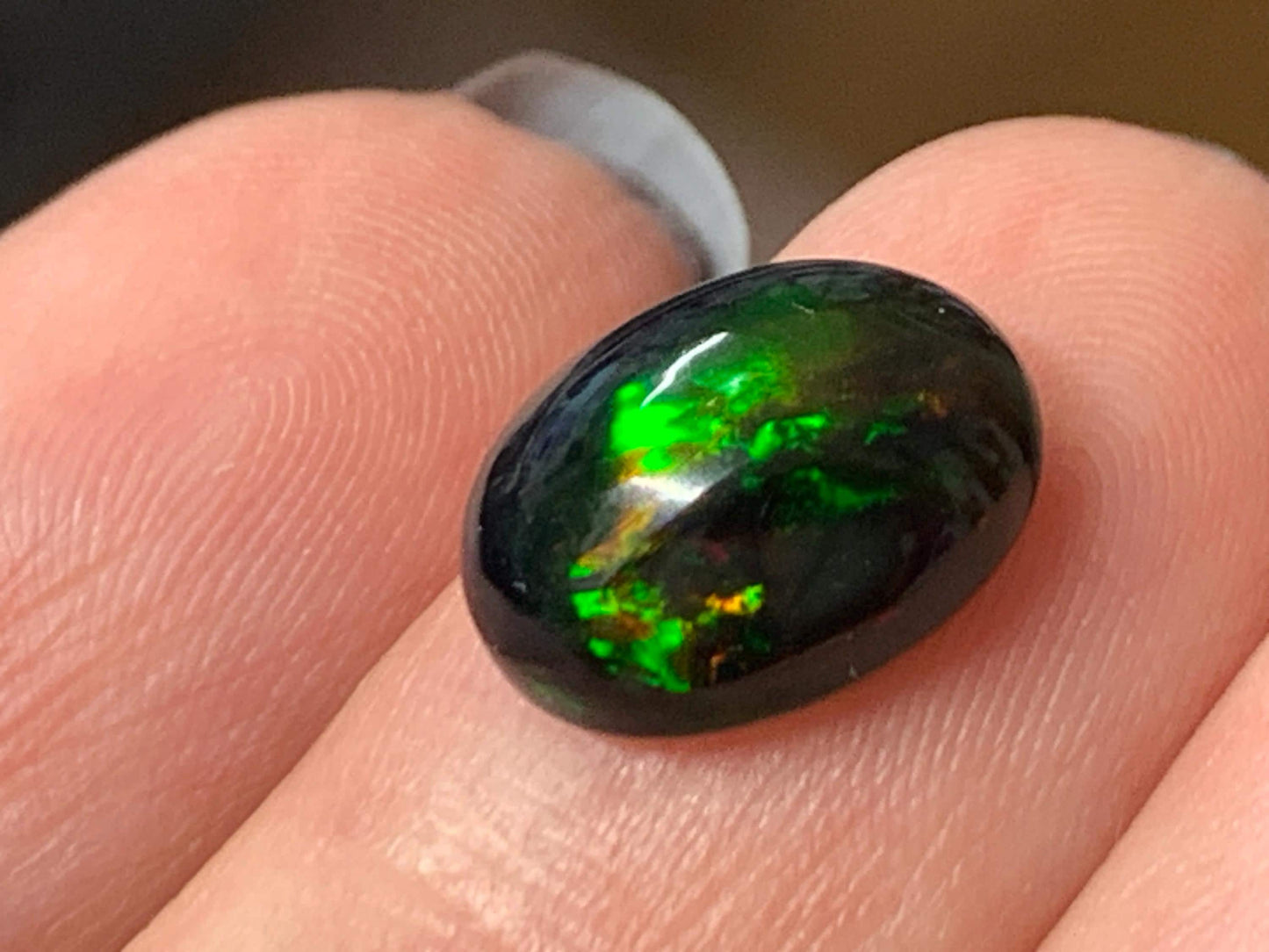 Natural Ethiopian Black Opal 9x12x5mm cabochon