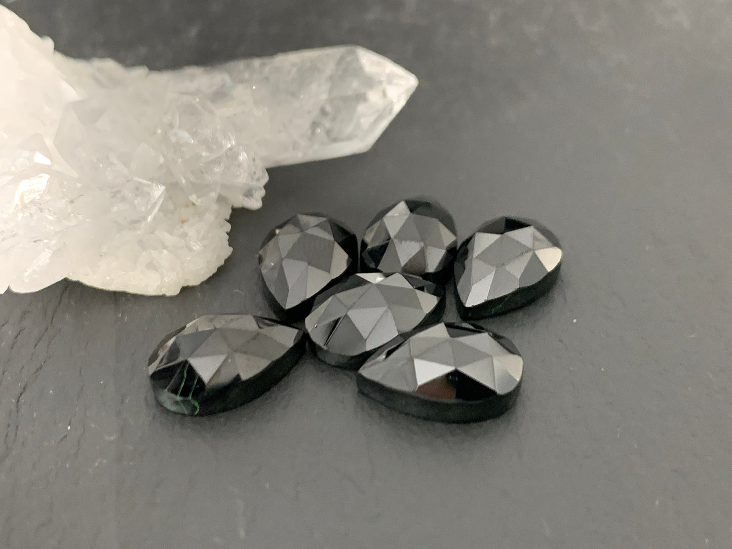 Faceted Black Spinel pear 8x12mm cabochon