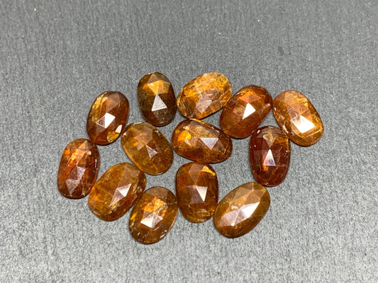 Damaged - faceted orange Kyanite oval 13mm long cabochons