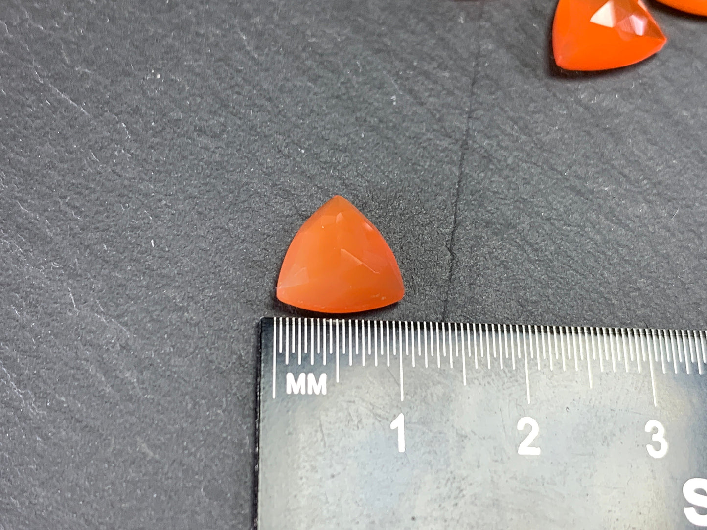 Faceted Carnelian Curved Triangle 10mm cabochon