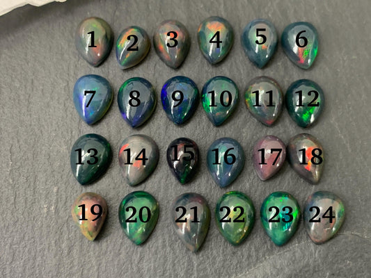 Black Ethiopian Opal 6x8mm cabochon