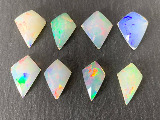 Faceted Ethiopian Opal kite 13mm long cabochon