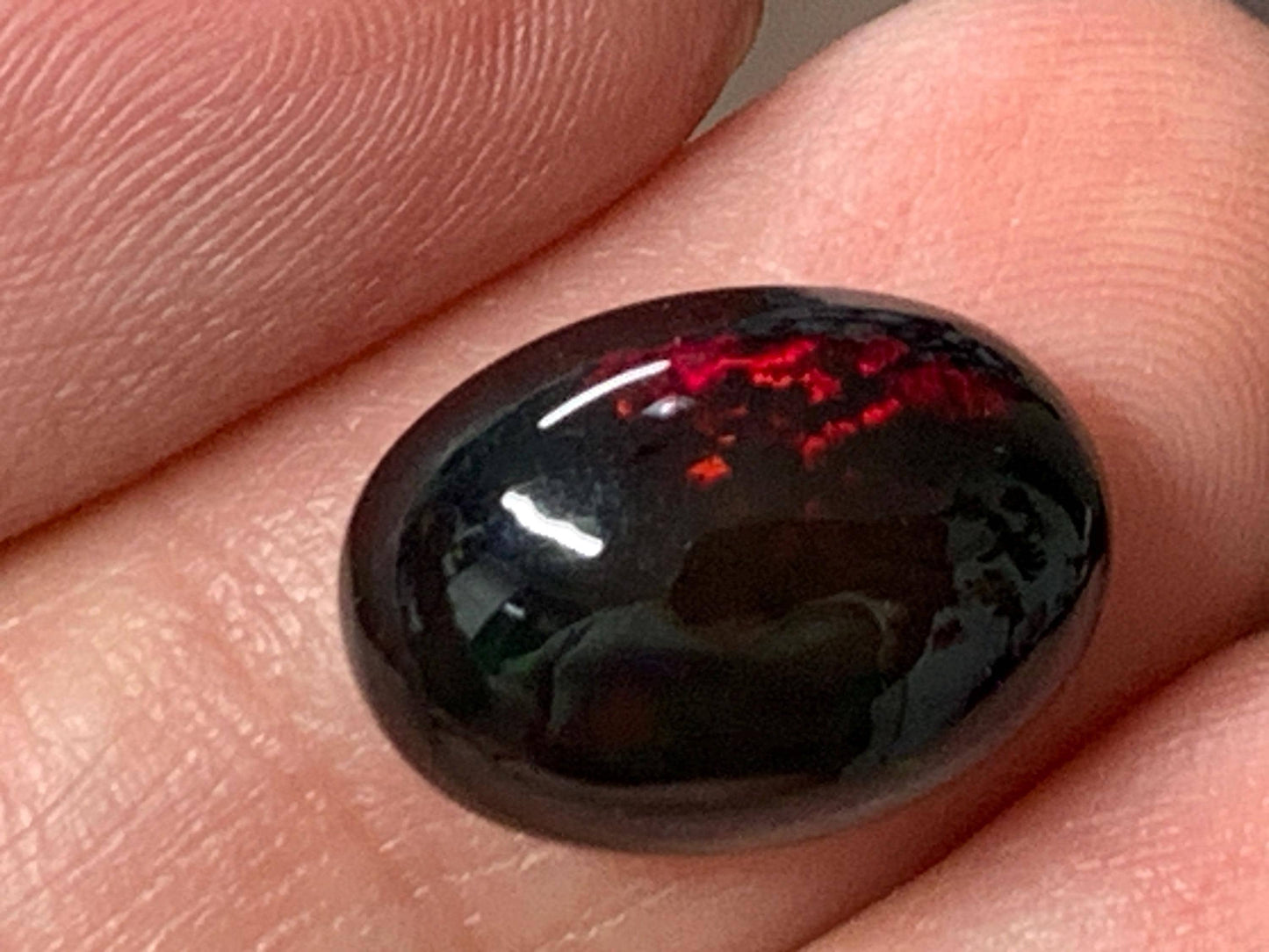 Natural Ethiopian Black Opal 10x14x6mm cabochon