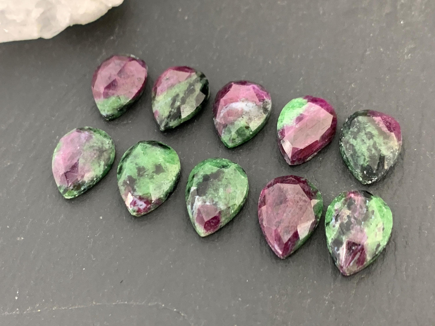 Faceted Ruby Zoisite 10x14mm cabochon.