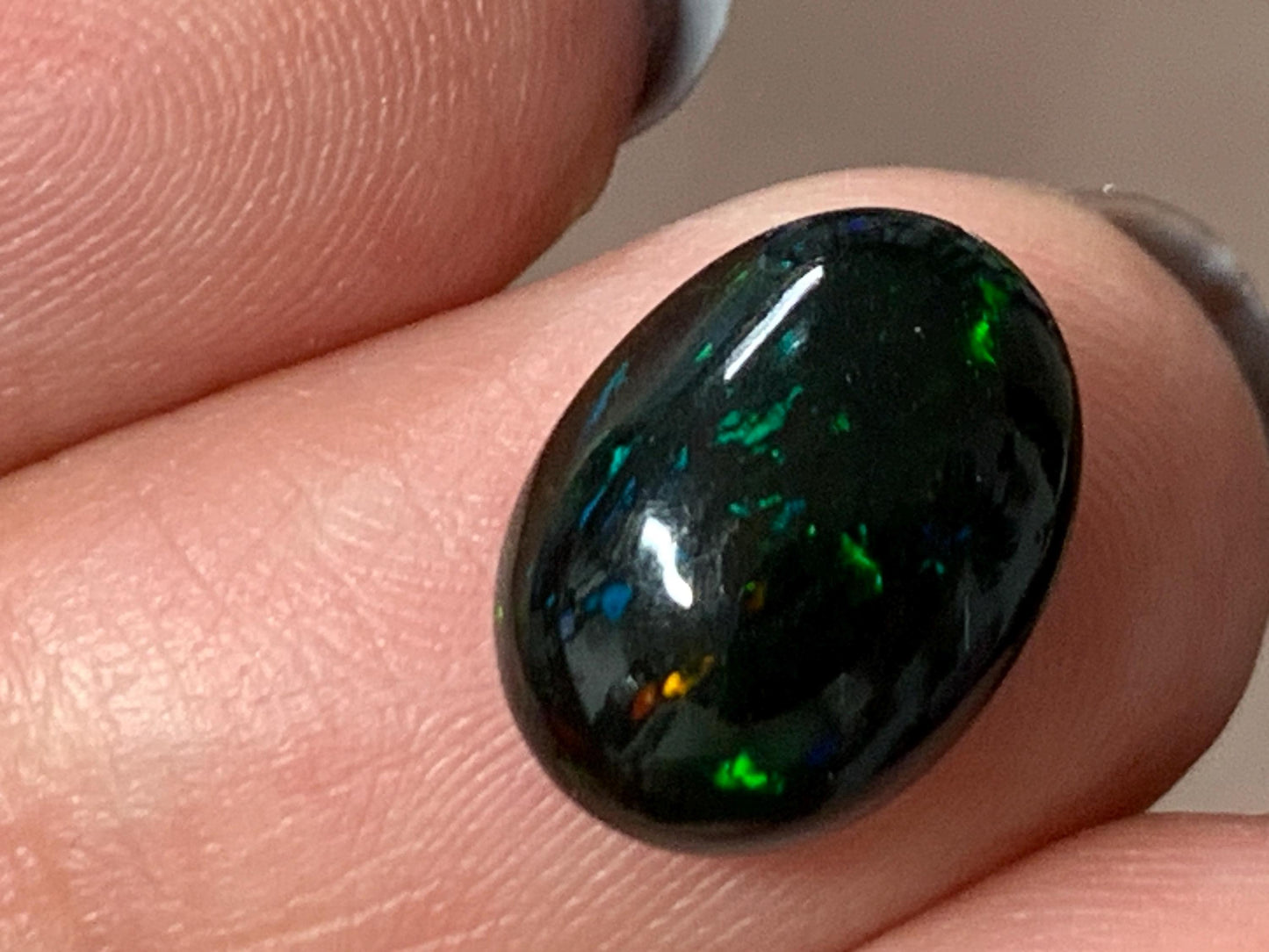 Natural Ethiopian Black Opal 9x12x4mm cabochon