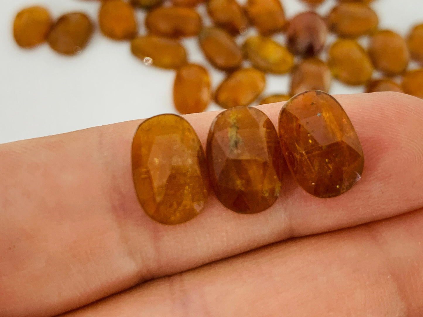 Faceted orange Kyanite oval 7x12mm cabochons