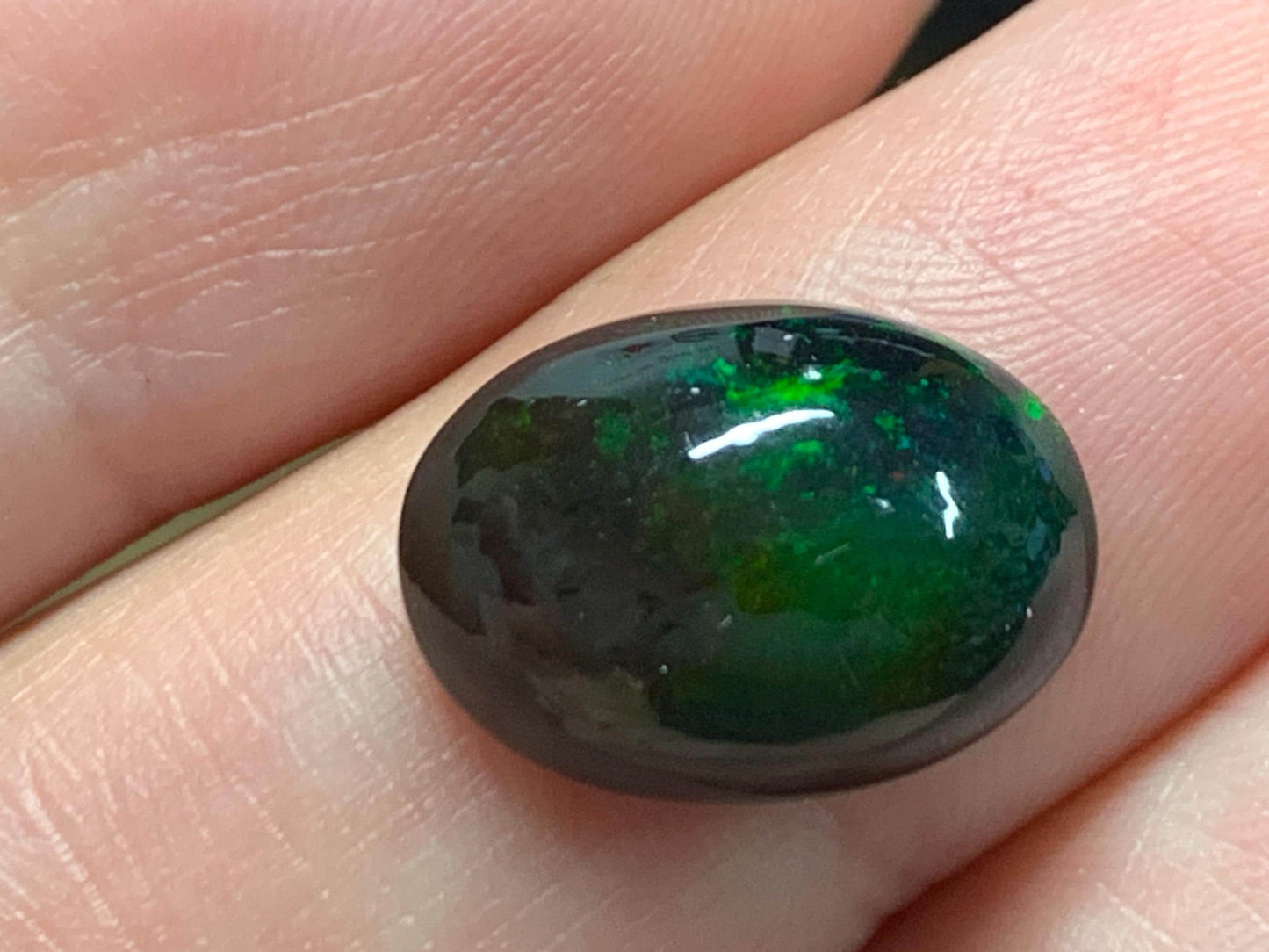 Natural Ethiopian Black Opal 10x14x6mm cabochon