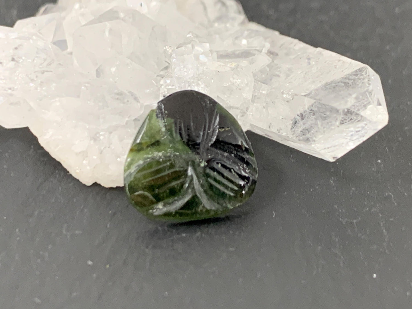 Carved Tourmaline 11x12x2mm cabochon