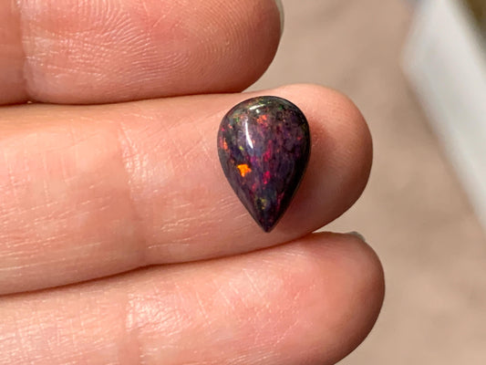 Black Ethiopian Opal pear 8x11x4mm cabochon