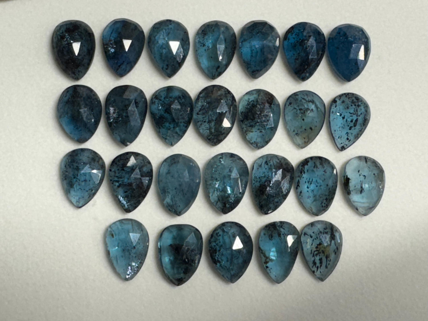 Faceted Moss Kyanite pear 10x14mm cabochon