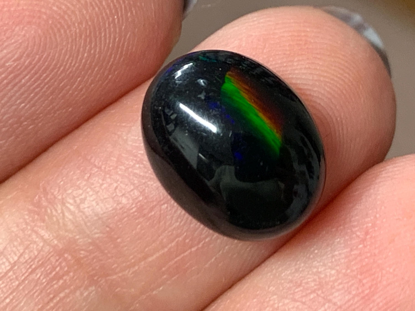 Natural Ethiopian Black Opal 10x12x5mm cabochon