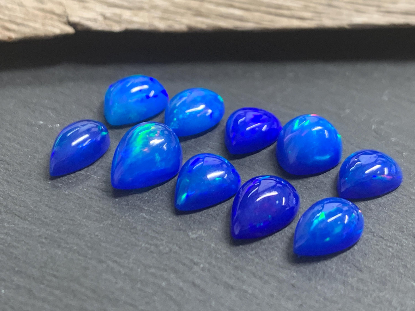 Ethiopian Opal pear 9-11mm long cabochon - Natural Opal smoked to blue color