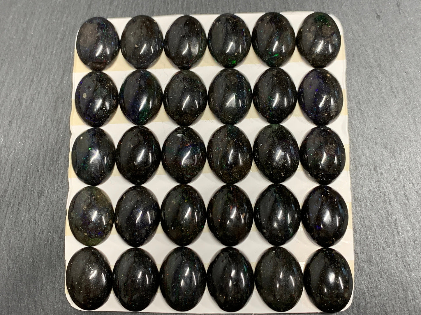 Black Andamooka Opal oval 10x14mm cabochon - Matrix Australian Opal