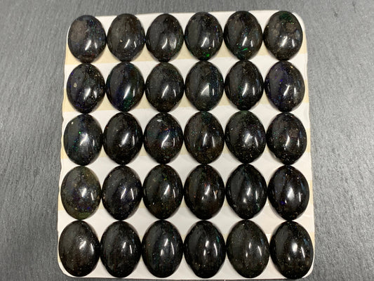Black Andamooka Opal oval 10x14mm cabochon - Matrix Australian Opal