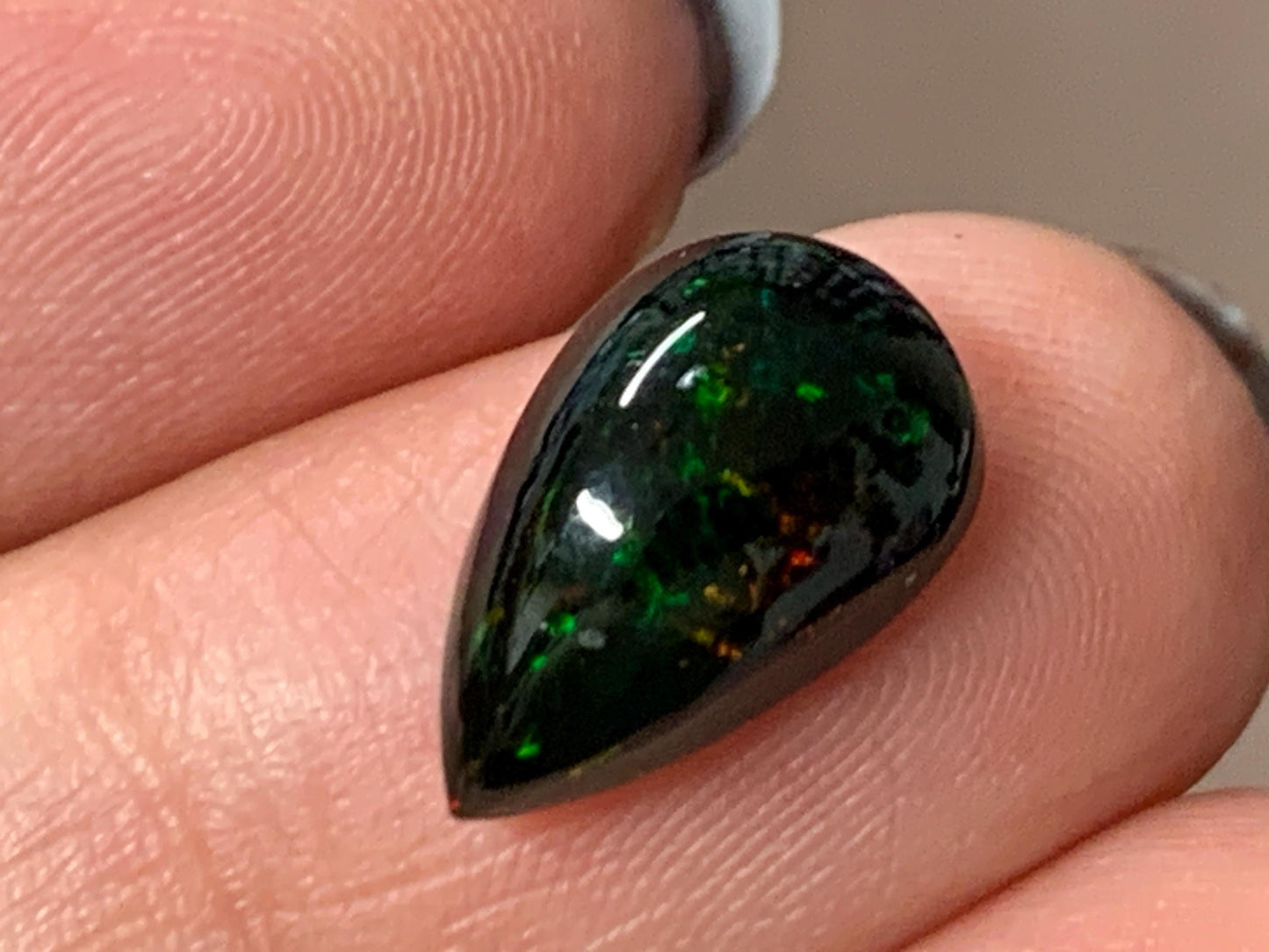 Natural Ethiopian Black Opal 8x14x6mm cabochon