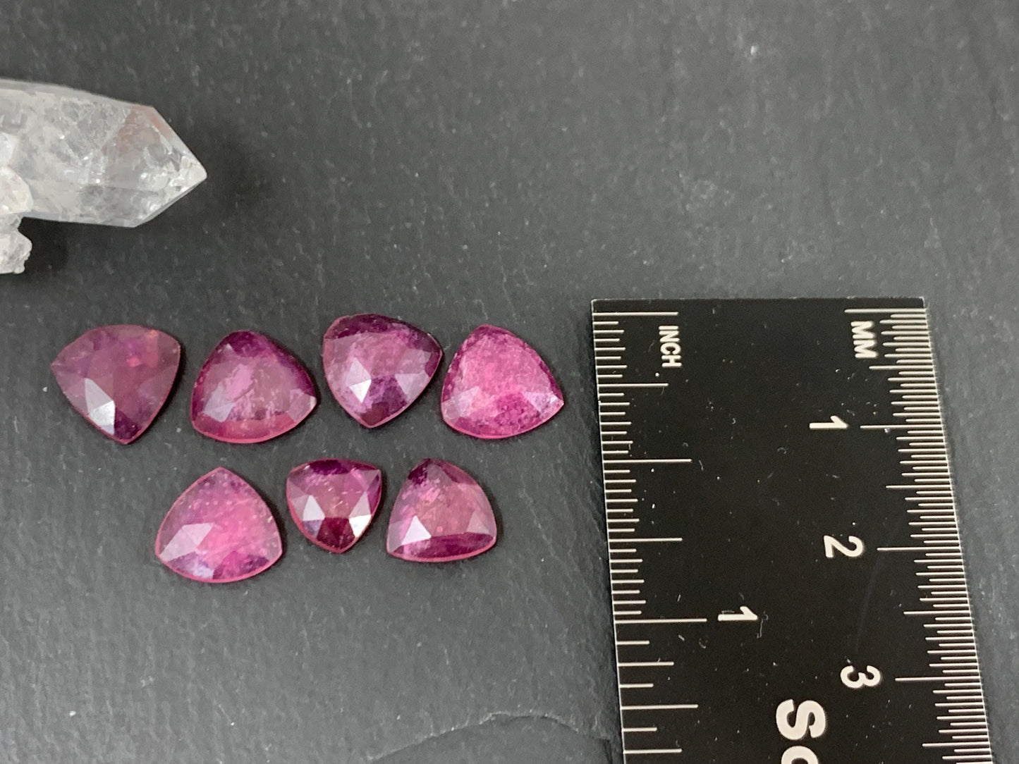 Faceted Thailand pink Sapphire triangle 7-10mm mm cabochon.
