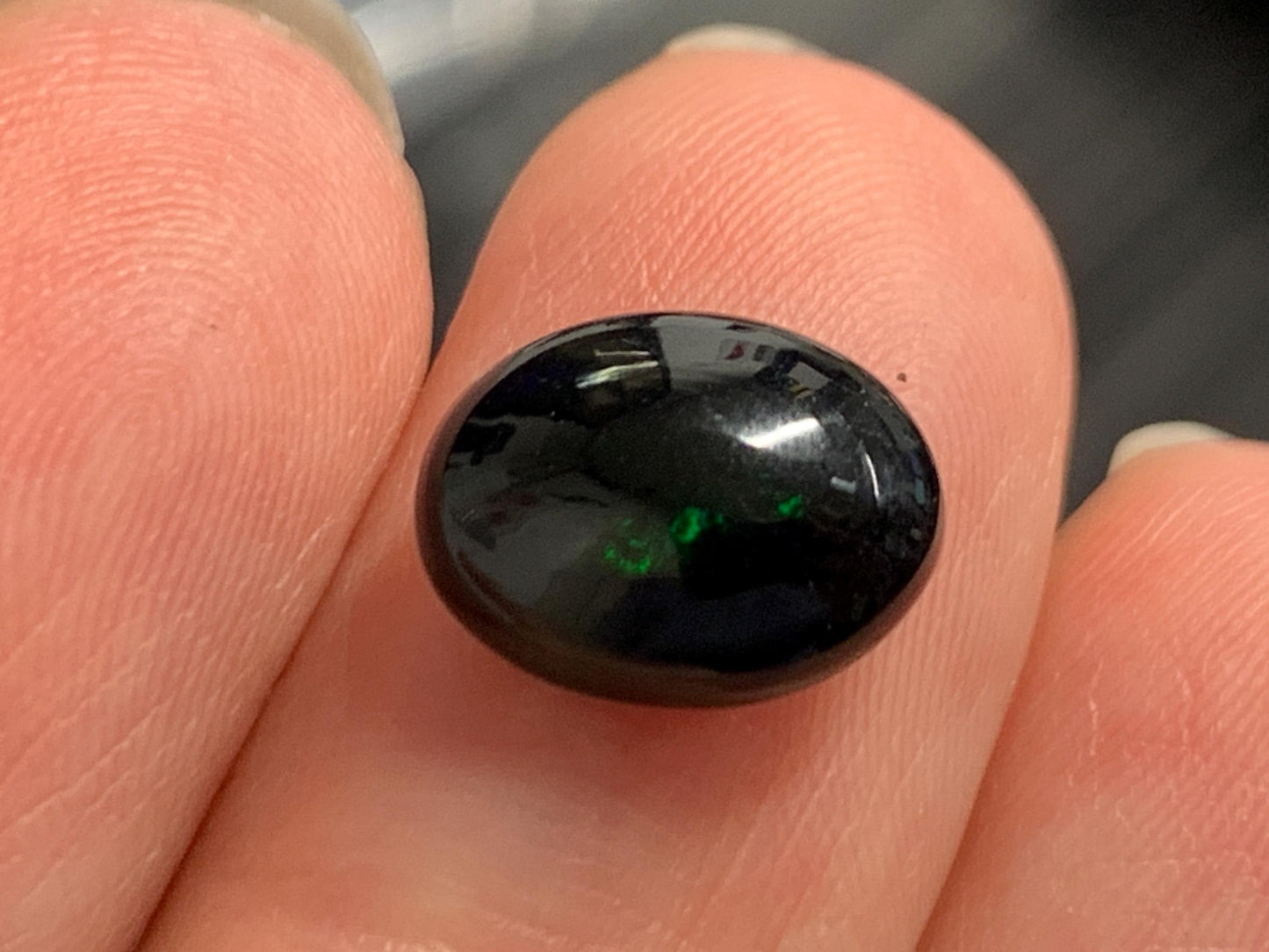 Natural Ethiopian Black Opal 8x11x4mm cabochon