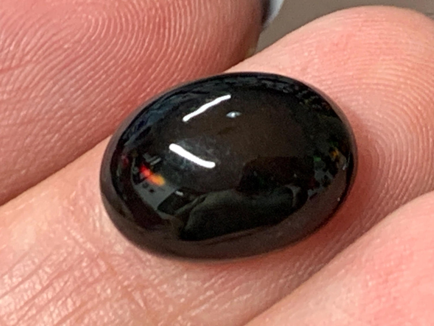Natural Ethiopian Black Opal 10x14x6mm cabochon