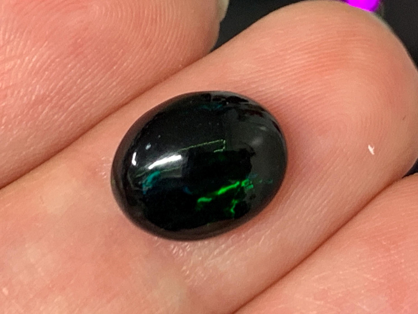 Natural Ethiopian Black Opal 9x11x4mm cabochon