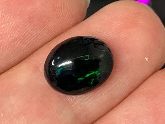 Natural Ethiopian Black Opal 9x11x4mm cabochon