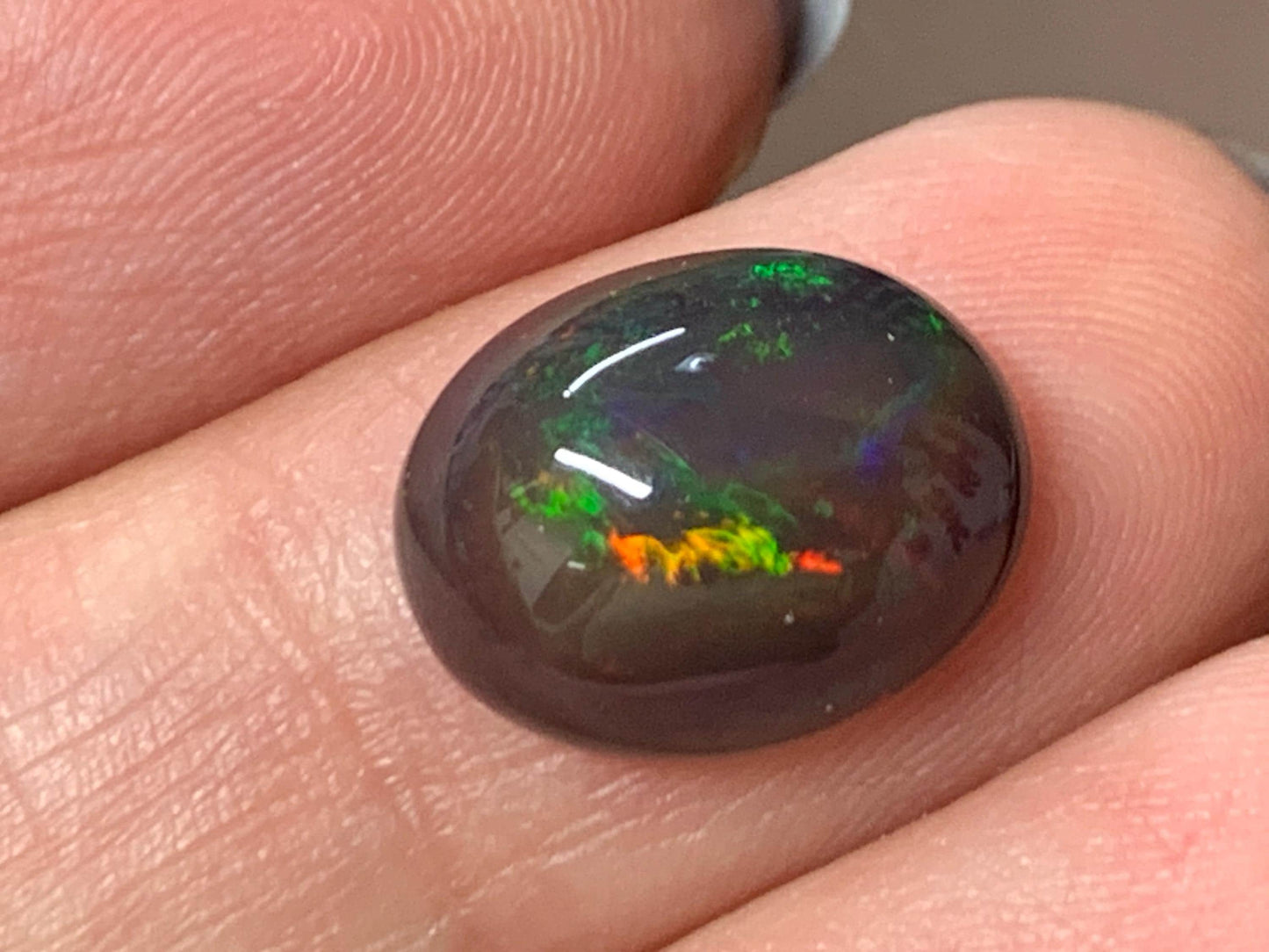 Natural Ethiopian Black Opal 10x13x5mm cabochon