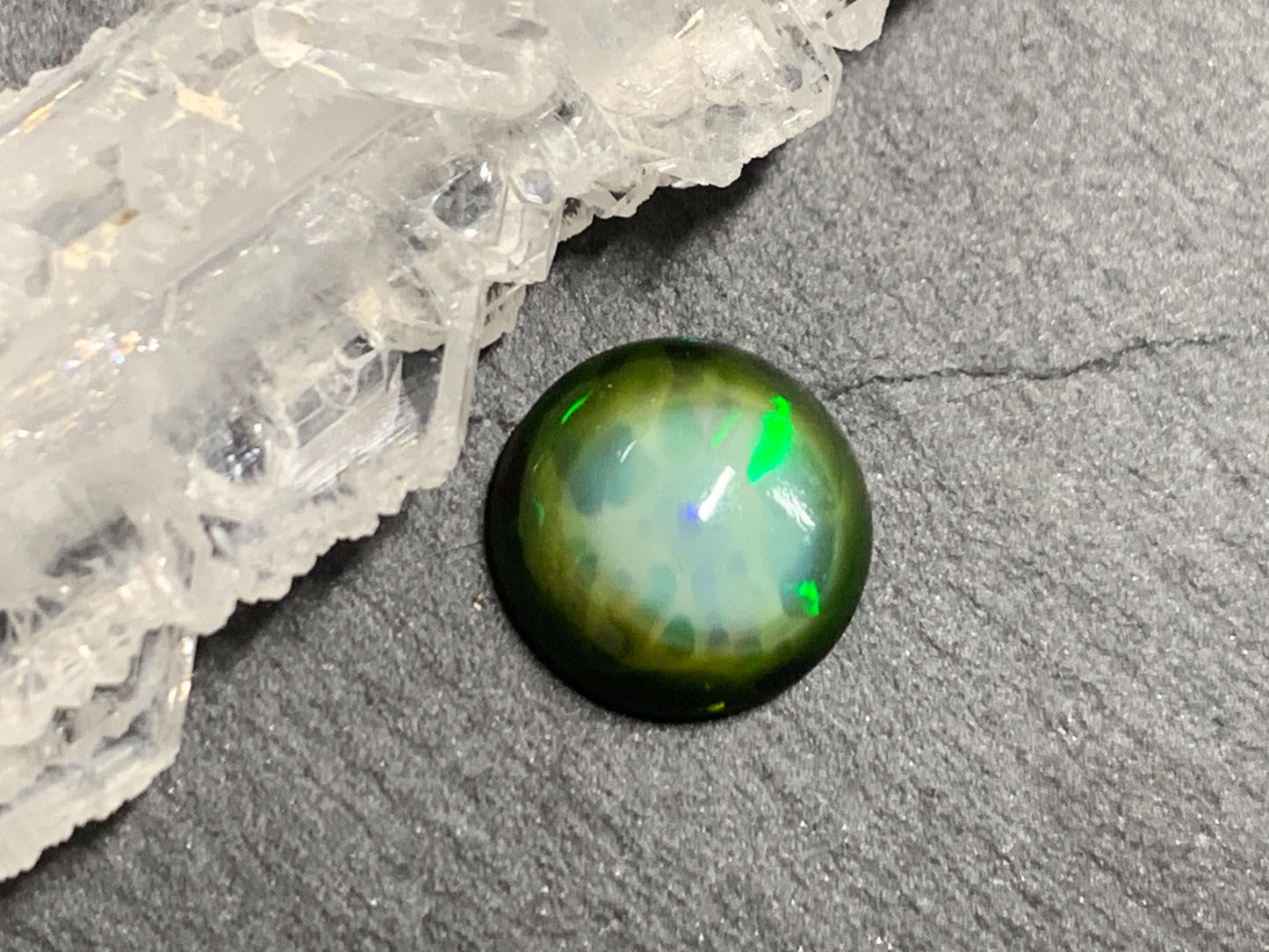 Natural Black Ethiopian Opal round 9.5x9.5x4mm cabochon