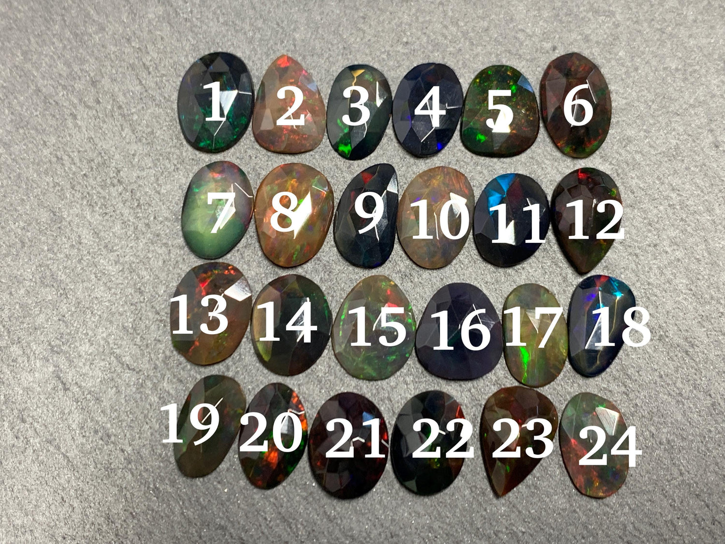 Faceted Black Ethiopian Opal 10-11mm long cabochon