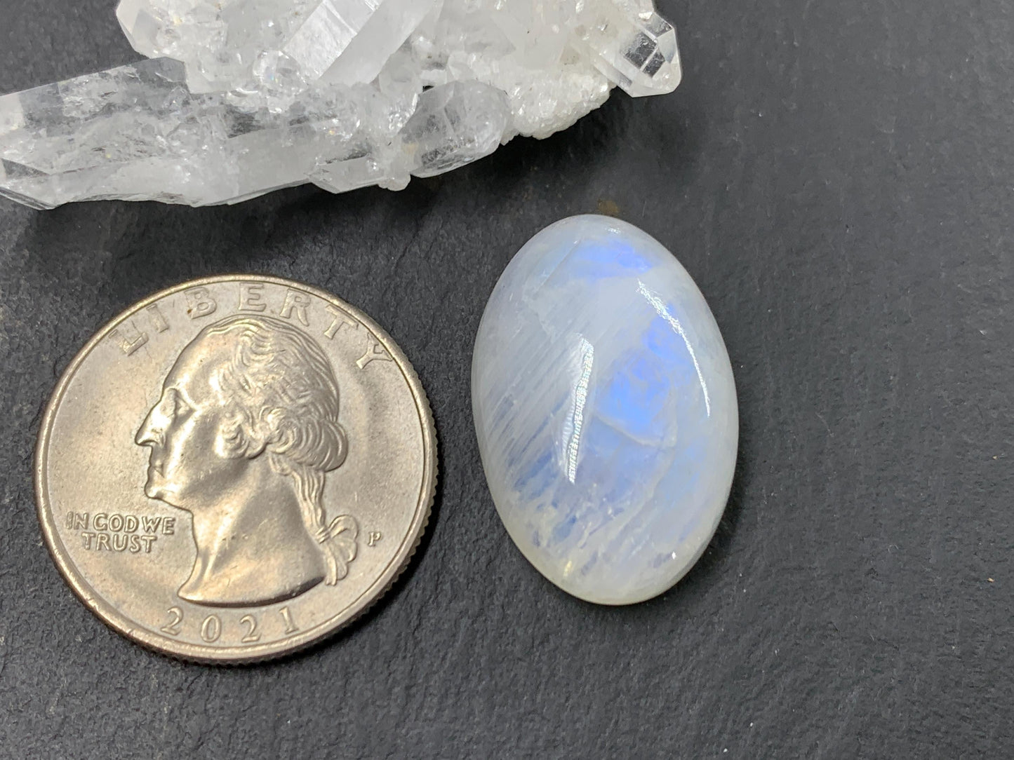 Rainbow Moonstone oval 24x16x9mm cabochon